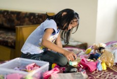 Child with Barbie